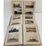 3 albums containing vintage photographs of boats and cargo ships.