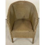 A child's vintage gold coloured Lloyd Loom chair, with date stamp, September 52.