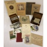 A box of assorted vintage booklets and ephemera.