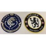 2 circular shaped painted cast iron Chelsea Football club wall hanging plaques.