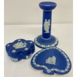 3 pieces of dark blue jasperware ceramics by Wedgwood.