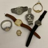 A collection of men's and ladies vintage and modern wristwatches in varying conditions.