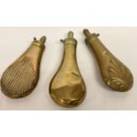 3 antique brass gunpowder flasks.