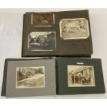 2 small early 20th century photograph albums containing a quantity of black and white photos.