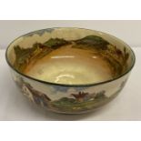 A Royal Doulton series ware fruit bowl with rural watermill design to inner and outer bowl.