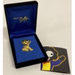 A boxed 9ct gold plated limited edition "Farewell Golly" badge by Robertson's. With CAO No 2401.
