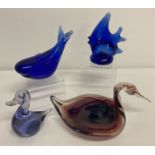 4 pieces of vintage coloured glass in the shape of animals.