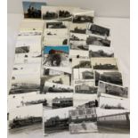 100+ vintage black and white photographs and postcards relating to trains and railways.