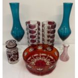 A collection of vintage coloured glass items.