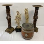 A pair of metal cane effect candlesticks together with a pair of oriental resin figures