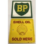 2 square shaped painted cast metal advertising signs for Shell and BP.