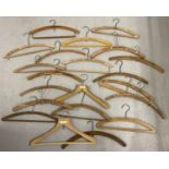 20 vintage wooden advertising coat hangers for hotels, tailors and cleaners.