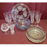 A box of assorted vintage glassware items.