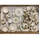 A box of vintage ceramic Oakham crested ware ceramic items, mostly Goss.