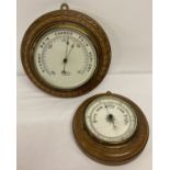 A vintage carved wooden cased circular wall hanging barometer by R.Bailey, Birmingham.