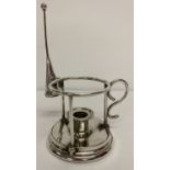 A James Dixon & sons silver plated chamberstick and candle snuffer with galleried sides.