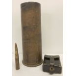 A vintage 105mm field gun shell case dated 1968.