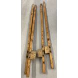 2 pairs of vintage wooden stilts.