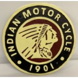 A painted cast iron circular shaped Indian Motorcycles wall hanging plaque.
