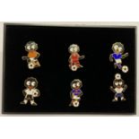 A cased set of 6 Euro 2000 football Golly badges by Robertson's.