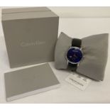 A boxed ladies wrist watch by Calvin Klein.