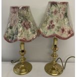 2 brass table lamps in a classical style with new floral lampshades.
