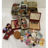 A box of mixed items. To include boxed Scottish doll and bagpipes.