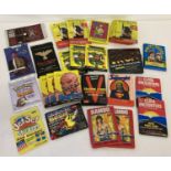 A quantity of assorted vintage sealed and unopened packs of trading cards.