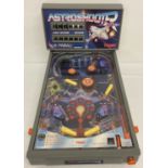 A vintage 1980's Tomy Astro Shooter electronic pinball game.