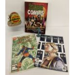 A small collection of comics and collectable items to include The Mammoth book of Zombie Comics.