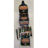 A full box of 50 unopened packs of Star Wars Trilogy Collection movie trading cards from Merlin.