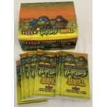 A full box of 36 Teenage Mutant Ninja Turtles sealed and unopened trading card packs.