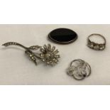 3 vintage silver and white metal brooches together with a vintage silver past, present, future ring.