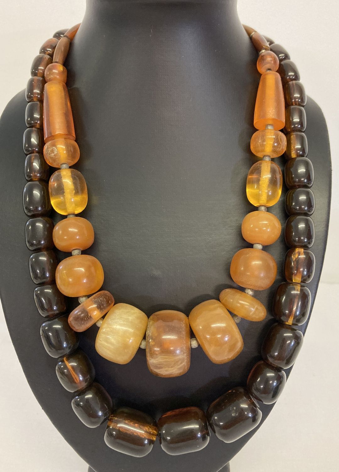 2 vintage amber style bead necklaces.