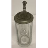 A German WWII style Bavarian glass lidded stein with engraved detail to glass and lid.