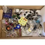 A Box of costume jewellery and watches to include vintage and modern stone set.