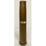 A WWII 40mm Bofors anti aircraft shell case, dated 1943.