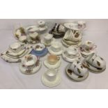 A collection of vintage cups, saucers and trio's by Shelley, Royal Worcester and Wedgwood.