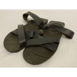 A pair of Vietnam war style Vietcong "Ho Chi Minh" sandals, made from rubber tyres.