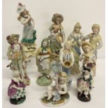 A collection of antique & vintage continental ceramic figurines.