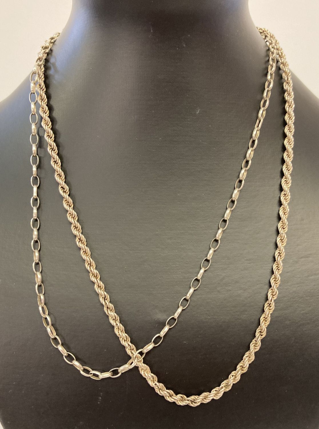 2 silver chain necklaces. A 20 inch belcher chain together with a 20 inch rope chain.