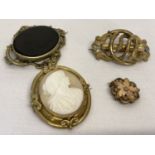 4 Victorian decorative and mourning brooches.