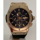 A men's Chronograph wrist watch by Paulareis with rose gold tone case, hour markers and hands.