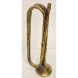 A WWII style brass trumpet with Hitler Youth engraved insignia. Mouthpiece missing.