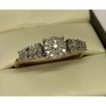 A 9ct gold diamond set Art Deco style dress ring. Set with ¼ct small round cut diamonds.