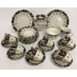 A collection of vintage Royal Stafford tea ware in a blue, green and brown floral pattern.