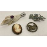 4 vintage and silver brooches.