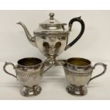 An antique silver plated tea set by W.M. Rogers, Hamilton Ontario.