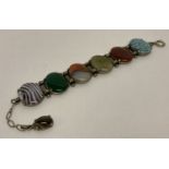 A vintage Scottish Miracle bracelet set with 6 large oval shaped glass cabochons.