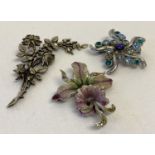 3 floral design vintage costume jewellery brooches.